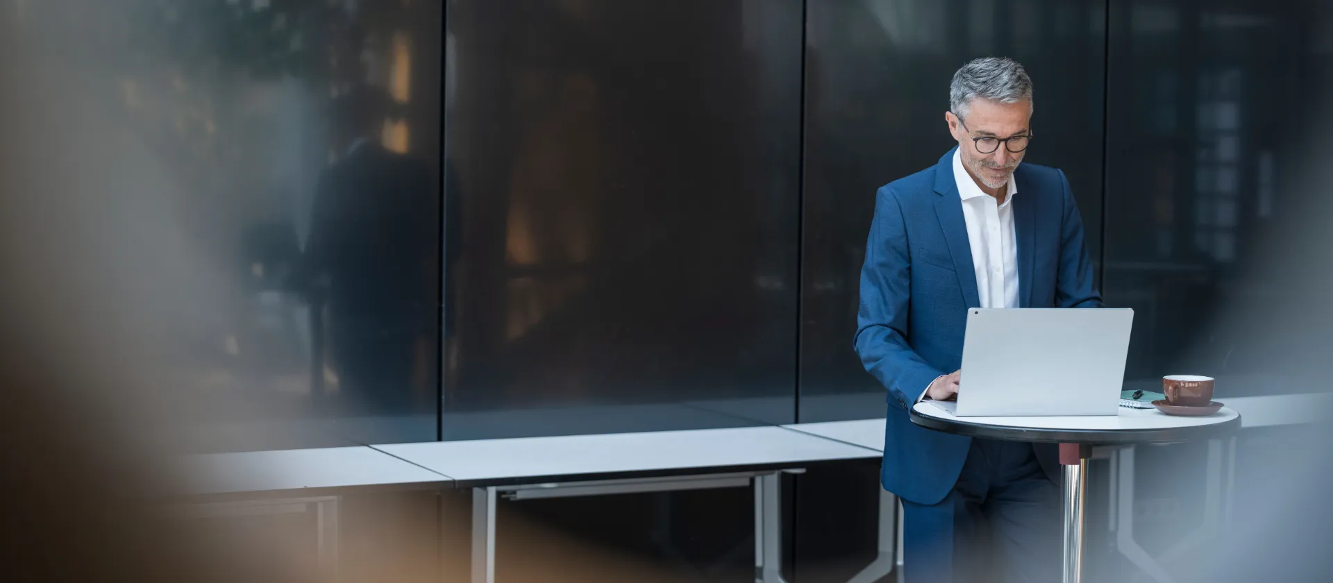 Foundation and architecture setup services for SAP Business Technology Platform by MSG Global with consultant working on laptop