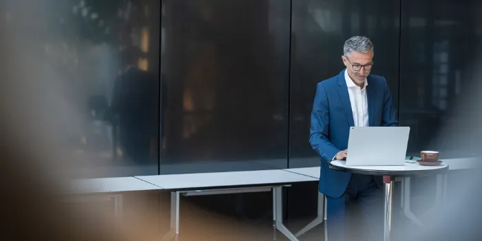 Foundation and architecture setup services for SAP Business Technology Platform by MSG Global with consultant working on laptop